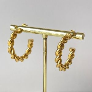 New 18k gold plated, stainless steel hoops. Gold color.